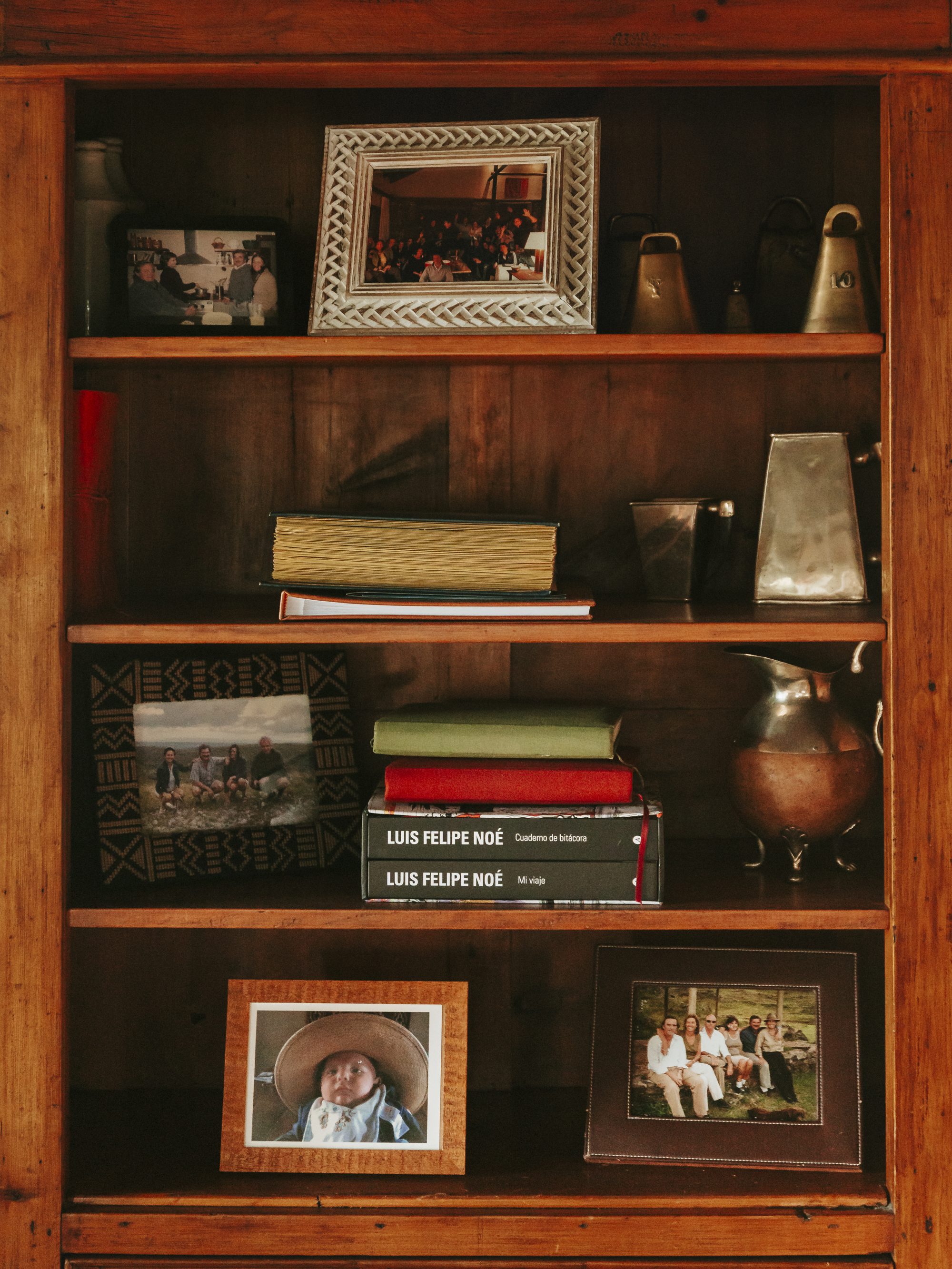 Bookshelf with family photographs