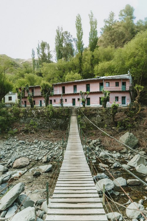 Suspension footbridge into the abandoned mining village
